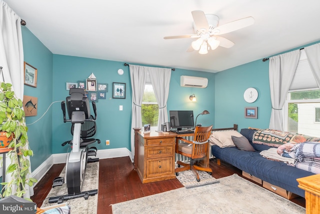 office area with dark wood-type flooring, a ceiling fan, baseboards, and a wall mounted AC
