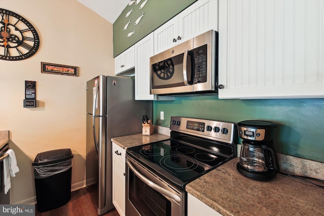 39234 Timberlake Ct Unit 9203, Bethany Beach, DE 19930 - kitchen featuring white cabinetry, stainless steel appliances, baseboards, and dark wood-style floors