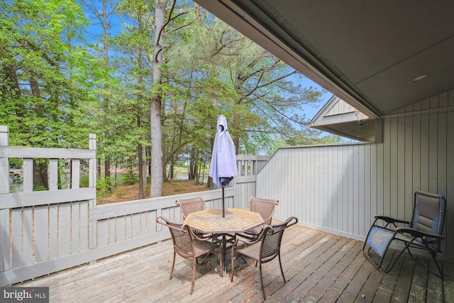 39234 Timberlake Ct Unit 9203, Bethany Beach, DE 19930 - wooden deck featuring outdoor dining area