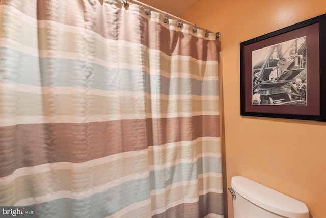 39234 Timberlake Ct Unit 9203, Bethany Beach, DE 19930 - bathroom featuring toilet and a shower with curtain