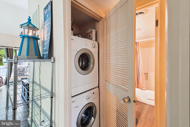 39234 Timberlake Ct Unit 9203, Bethany Beach, DE 19930 - laundry room with stacked washer and clothes dryer and laundry area