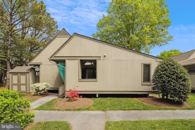 39234 Timberlake Ct Unit 9203, Bethany Beach, DE 19930 - view of front of house featuring an outbuilding and a storage unit
