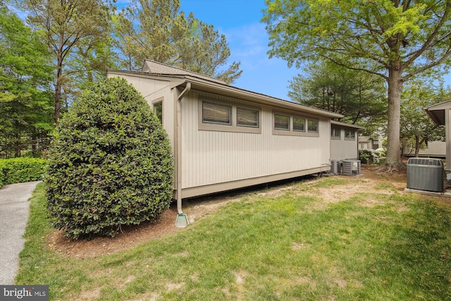 39234 Timberlake Ct Unit 9203, Bethany Beach, DE 19930 - view of home's exterior with a yard and central AC unit