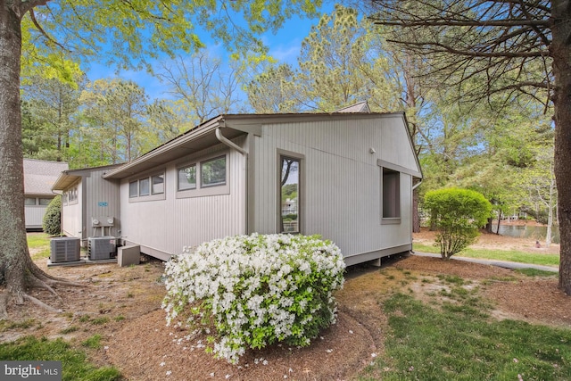39234 Timberlake Ct Unit 9203, Bethany Beach, DE 19930 - view of property exterior featuring central AC