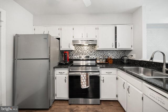 kitchen with a sink, appliances with stainless steel finishes, under cabinet range hood, and white cabinetry