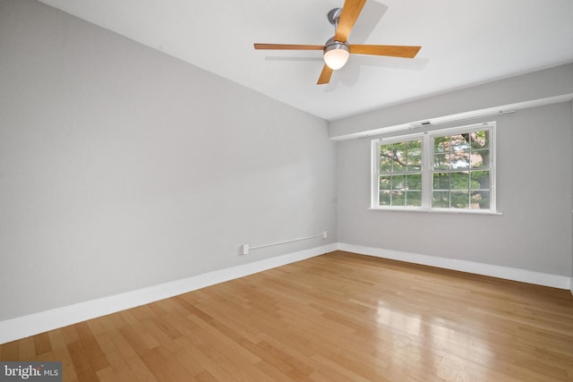 1301 N Ode St Unit 135, Arlington, VA 22209 - empty room featuring light wood-style floors, ceiling fan, and baseboards
