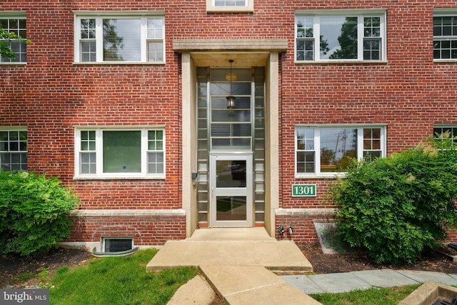 1301 N Ode St Unit 135, Arlington, VA 22209 - doorway to property featuring brick siding