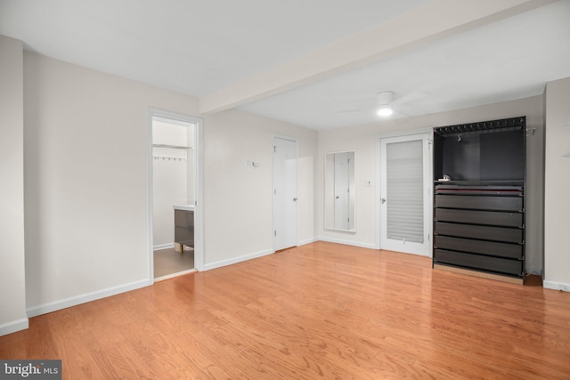 1417 Franklin St, Fredericksburg, VA 22401 - unfurnished bedroom with light wood-style flooring, baseboards, and connected bathroom