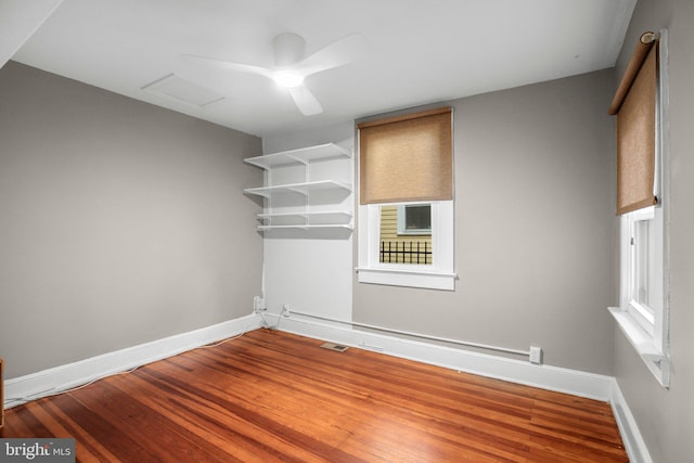 1417 Franklin St, Fredericksburg, VA 22401 - empty room featuring baseboards, wood finished floors, and attic access