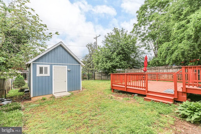 1417 Franklin St, Fredericksburg, VA 22401 - view of yard with an outbuilding, a wooden deck, and a storage shed