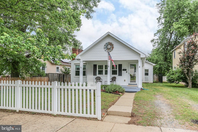 1417 Franklin St, Fredericksburg, VA 22401 - bungalow-style home with covered porch and a chimney