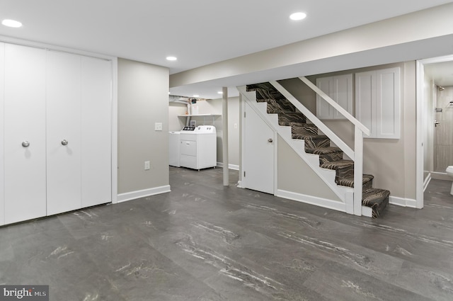 6248 Woodcrest Ave, Baltimore, MD 21209 - finished below grade area with recessed lighting, baseboards, washing machine and dryer, and stairway
