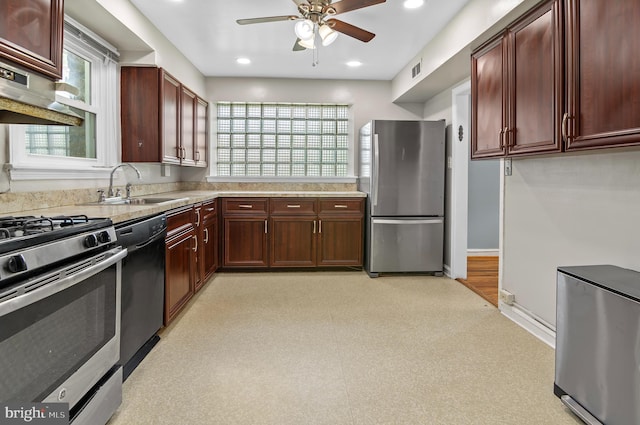 6248 Woodcrest Ave, Baltimore, MD 21209 - kitchen featuring light countertops, a sink, a ceiling fan, and stainless steel appliances