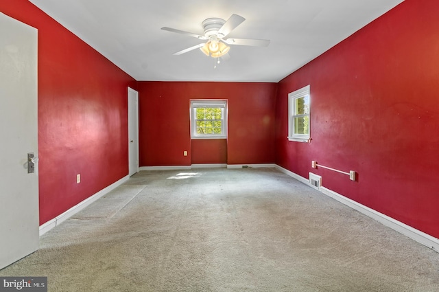 6248 Woodcrest Ave, Baltimore, MD 21209 - carpeted empty room featuring visible vents, a ceiling fan, and baseboards