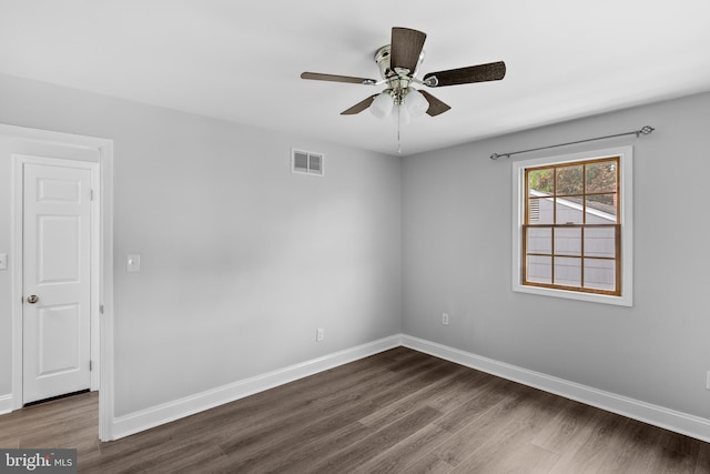 310 18th Ave, Baltimore, MD 21225 - unfurnished room with ceiling fan, baseboards, visible vents, and dark wood finished floors