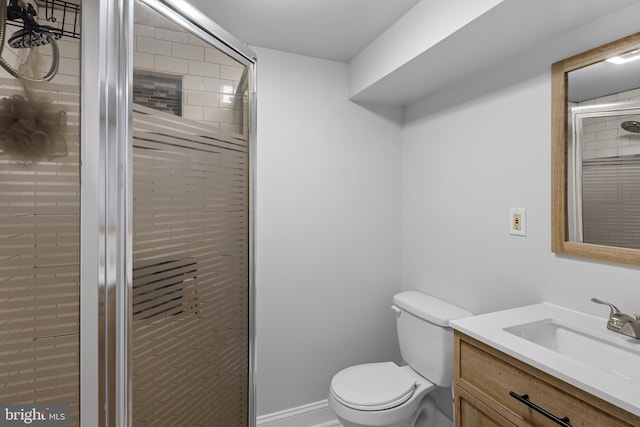 310 18th Ave, Baltimore, MD 21225 - bathroom featuring vanity, toilet, and a stall shower