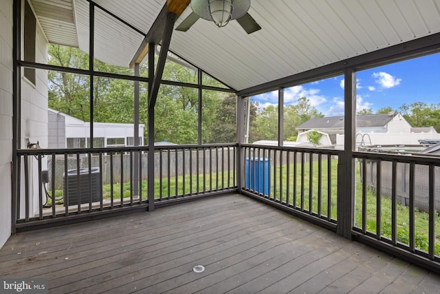 310 18th Ave, Baltimore, MD 21225 - unfurnished sunroom featuring beamed ceiling, a ceiling fan, and a healthy amount of sunlight