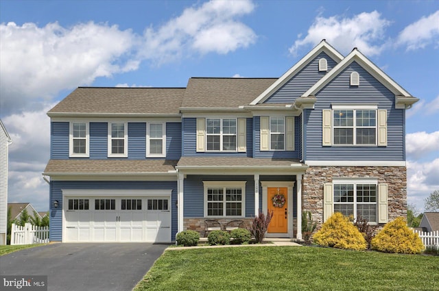 108 Vista Dr, Hummelstown, PA 17036 - view of front of property with asphalt driveway, stone siding, an attached garage, and a shingled roof