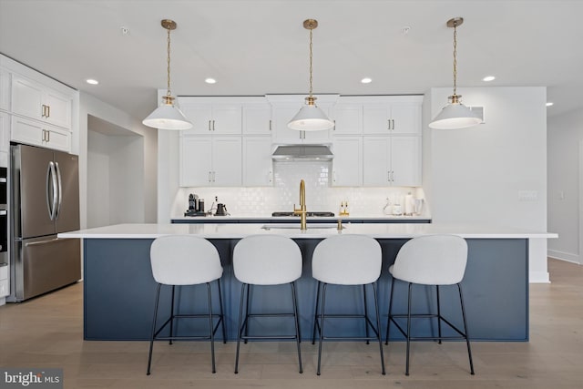 9 Mill Creek Dr, Doylestown, PA 18901 - kitchen featuring recessed lighting, appliances with stainless steel finishes, under cabinet range hood, and tasteful backsplash