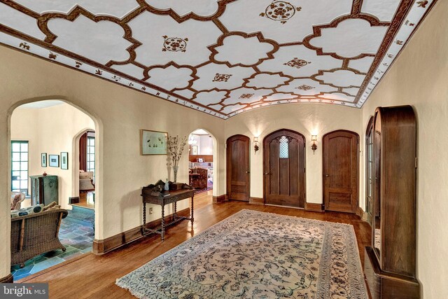 218 Parkside Ave, Trenton, NJ 08618 - entrance foyer featuring arched walkways, wood finished floors, and baseboards