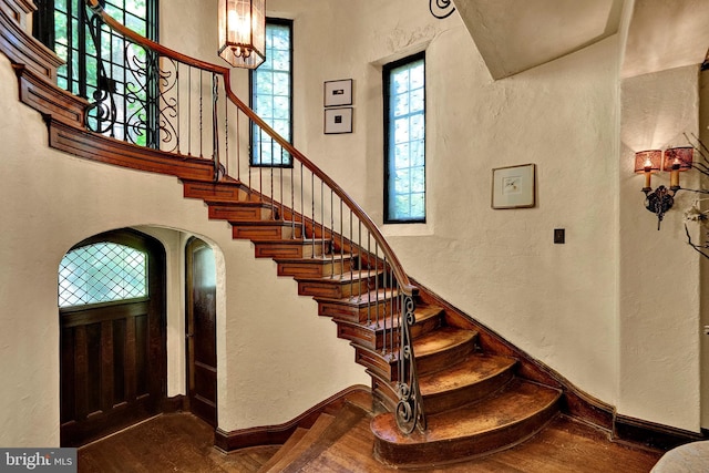 218 Parkside Ave, Trenton, NJ 08618 - stairway featuring a textured wall, hardwood / wood-style floors, and baseboards