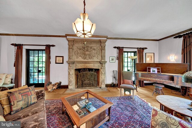 218 Parkside Ave, Trenton, NJ 08618 - living room featuring wood finished floors, a high end fireplace, baseboards, and ornamental molding