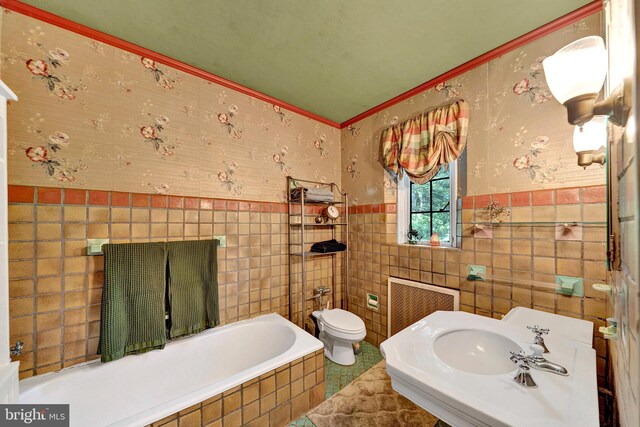 218 Parkside Ave, Trenton, NJ 08618 - full bathroom with tile walls, tiled bath, radiator heating unit, toilet, and crown molding