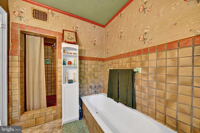 218 Parkside Ave, Trenton, NJ 08618 - full bath featuring tile walls, a garden tub, a wainscoted wall, tiled shower, and wallpapered walls