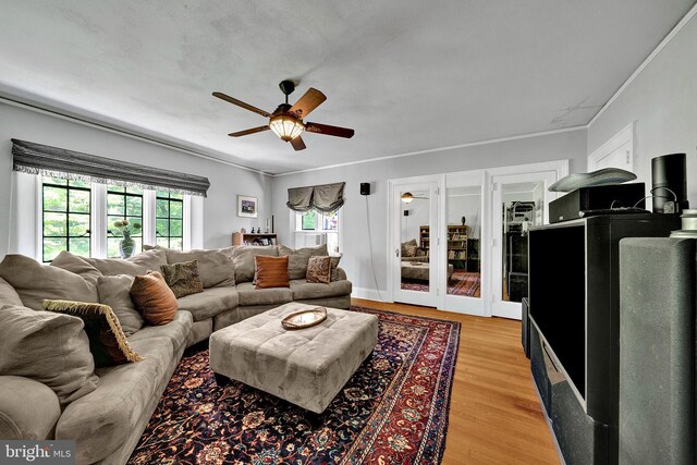 218 Parkside Ave, Trenton, NJ 08618 - living room featuring a ceiling fan, light wood-style floors, and ornamental molding