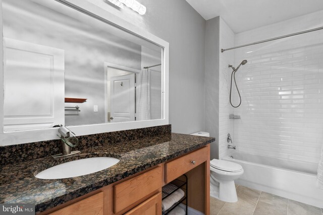 bathroom with shower / bathtub combination, toilet, tile patterned floors, and vanity