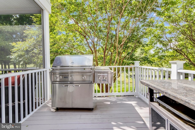 117 Kings Creek Cir, Rehoboth Beach, DE 19971 - deck featuring view of wooded area