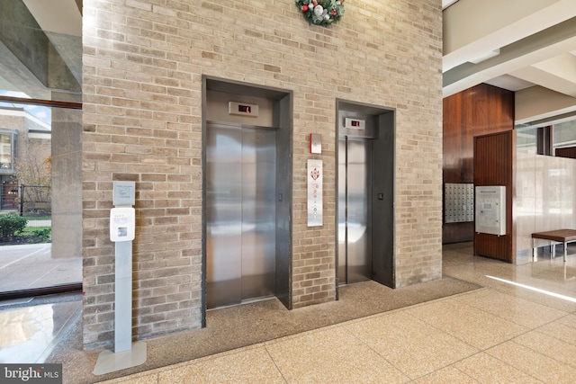 property entrance featuring elevator