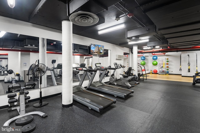 gym with ornate columns