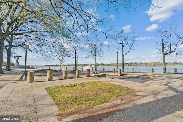 view of property's community featuring a water view