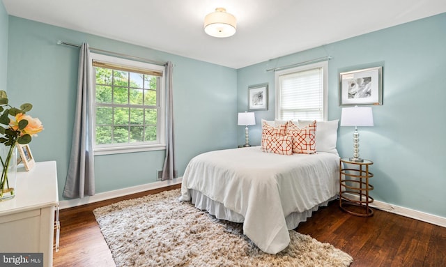 708 W Timber Branch Pkwy, Alexandria, VA 22302 - bedroom with wood finished floors and baseboards