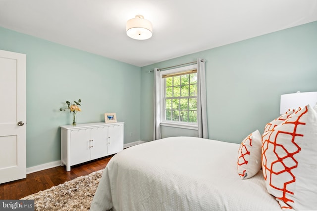 708 W Timber Branch Pkwy, Alexandria, VA 22302 - bedroom featuring wood finished floors and baseboards