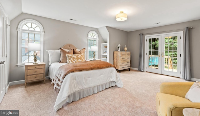 708 W Timber Branch Pkwy, Alexandria, VA 22302 - carpeted bedroom with access to exterior, french doors, baseboards, and vaulted ceiling
