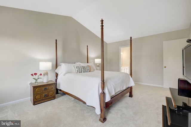 73 Mcpherson Cir, Sterling, VA 20165 - bedroom featuring vaulted ceiling, light colored carpet, baseboards, and ensuite bathroom