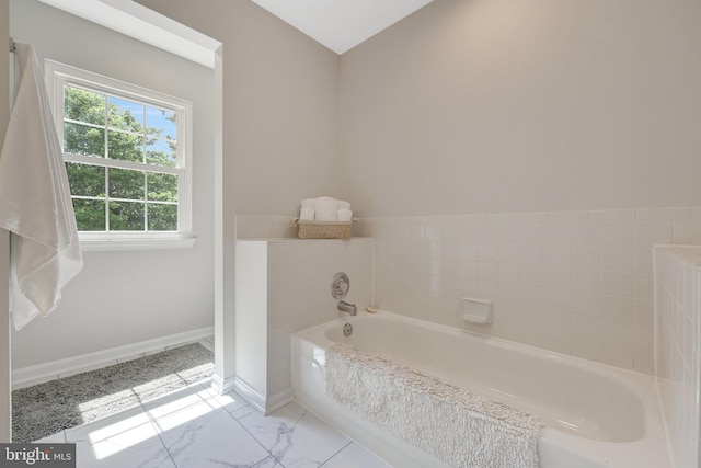 73 Mcpherson Cir, Sterling, VA 20165 - full bath with a bath, marble look tiles, and baseboards