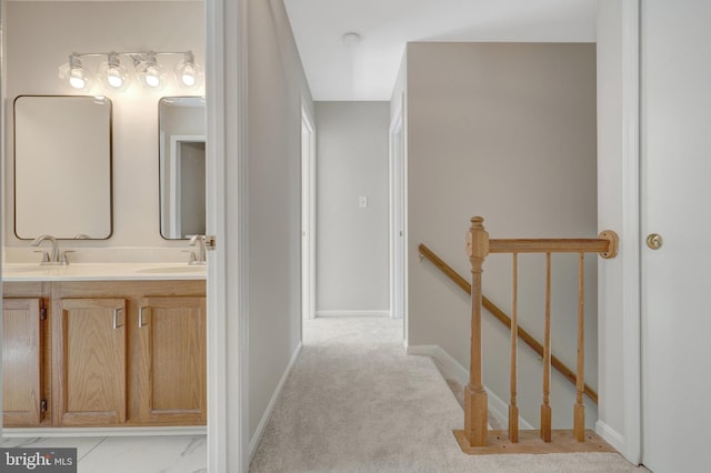 73 Mcpherson Cir, Sterling, VA 20165 - bathroom with double vanity and baseboards