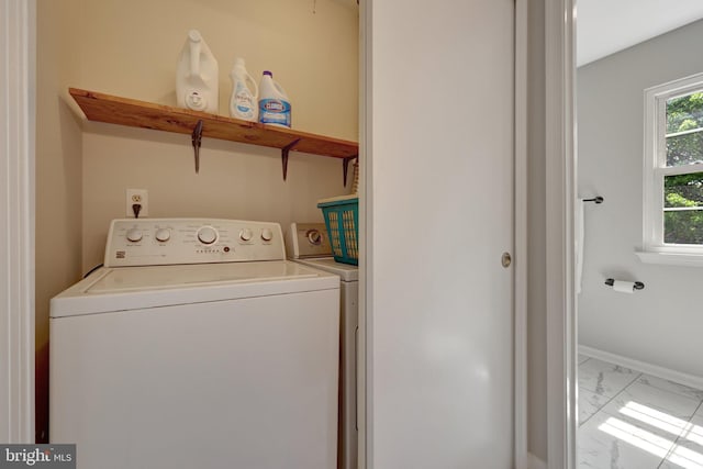 73 Mcpherson Cir, Sterling, VA 20165 - clothes washing area with light marble finish flooring, washing machine and dryer, and baseboards