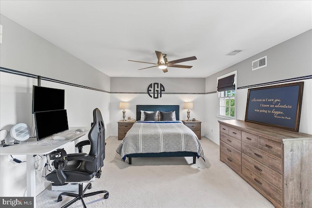 bedroom with visible vents, ceiling fan, and light colored carpet