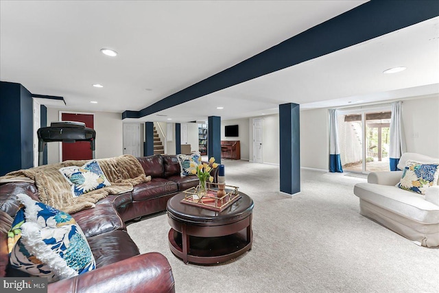 carpeted living room featuring recessed lighting, baseboards, and stairway
