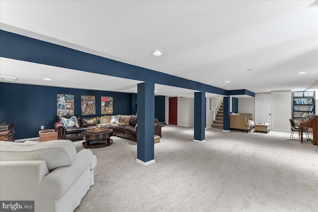 living room featuring recessed lighting, carpet flooring, and stairs