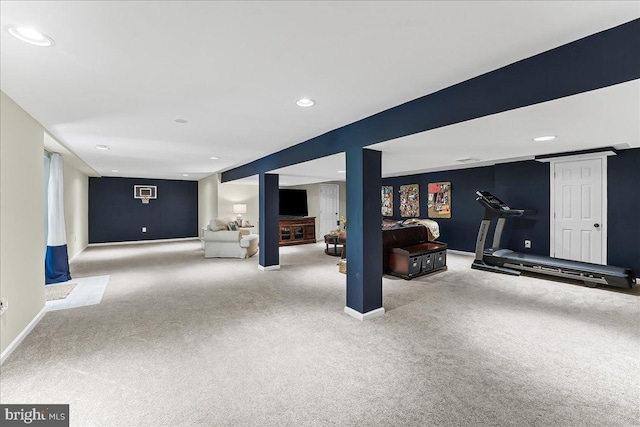 finished basement featuring baseboards, carpet, and recessed lighting