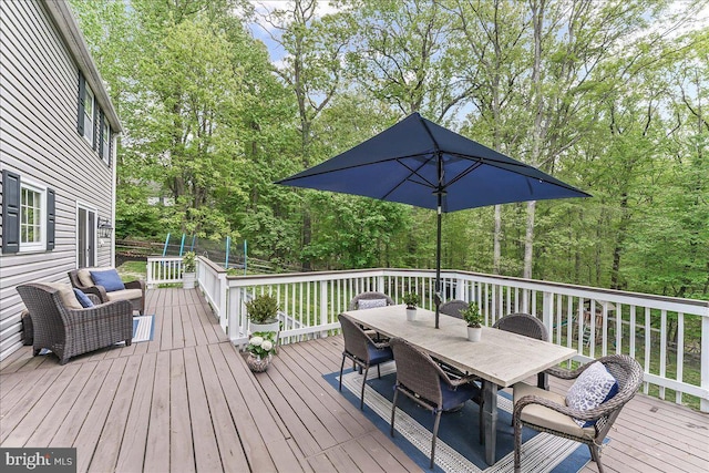deck featuring outdoor dining space