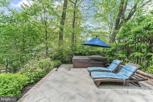 view of patio featuring a hot tub
