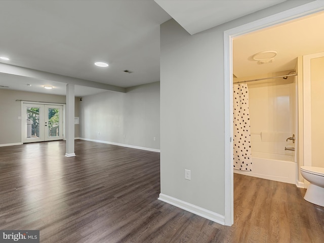 112 Rebels Cir, Winchester, VA 22602 - unfurnished living room featuring dark wood-style flooring, french doors, baseboards, and recessed lighting