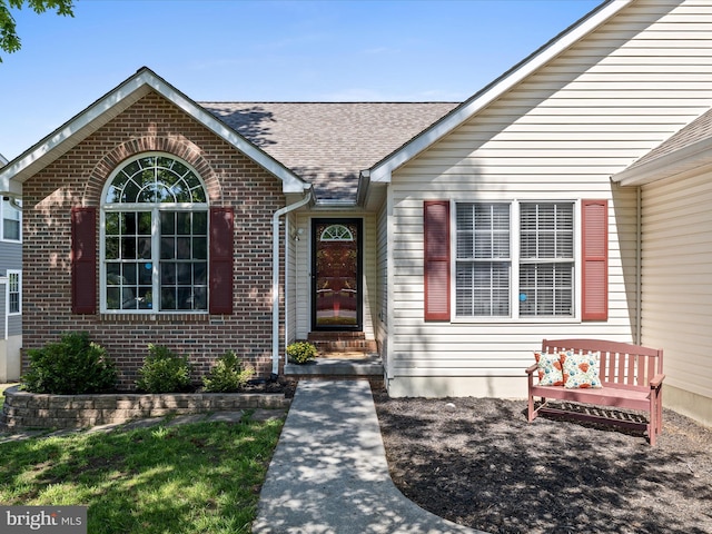 112 Rebels Cir, Winchester, VA 22602 - entrance to property with brick siding and roof with shingles