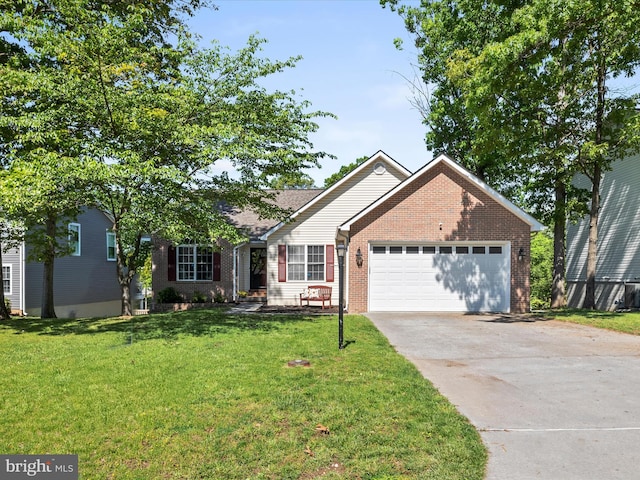 112 Rebels Cir, Winchester, VA 22602 - single story home featuring brick siding, a garage, concrete driveway, and a front yard